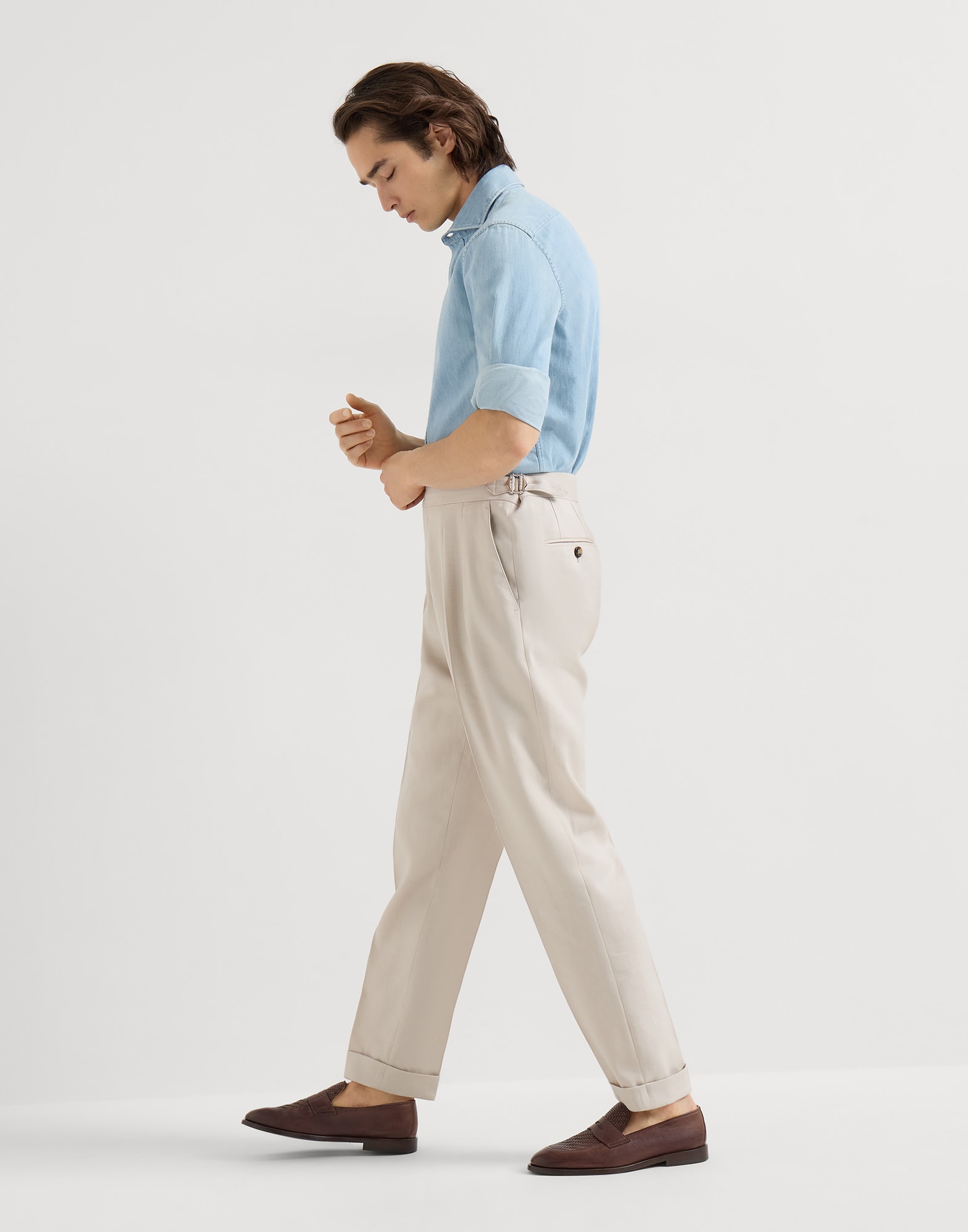 Trousers with double pleats and tabs for Man in Buff | Brunello