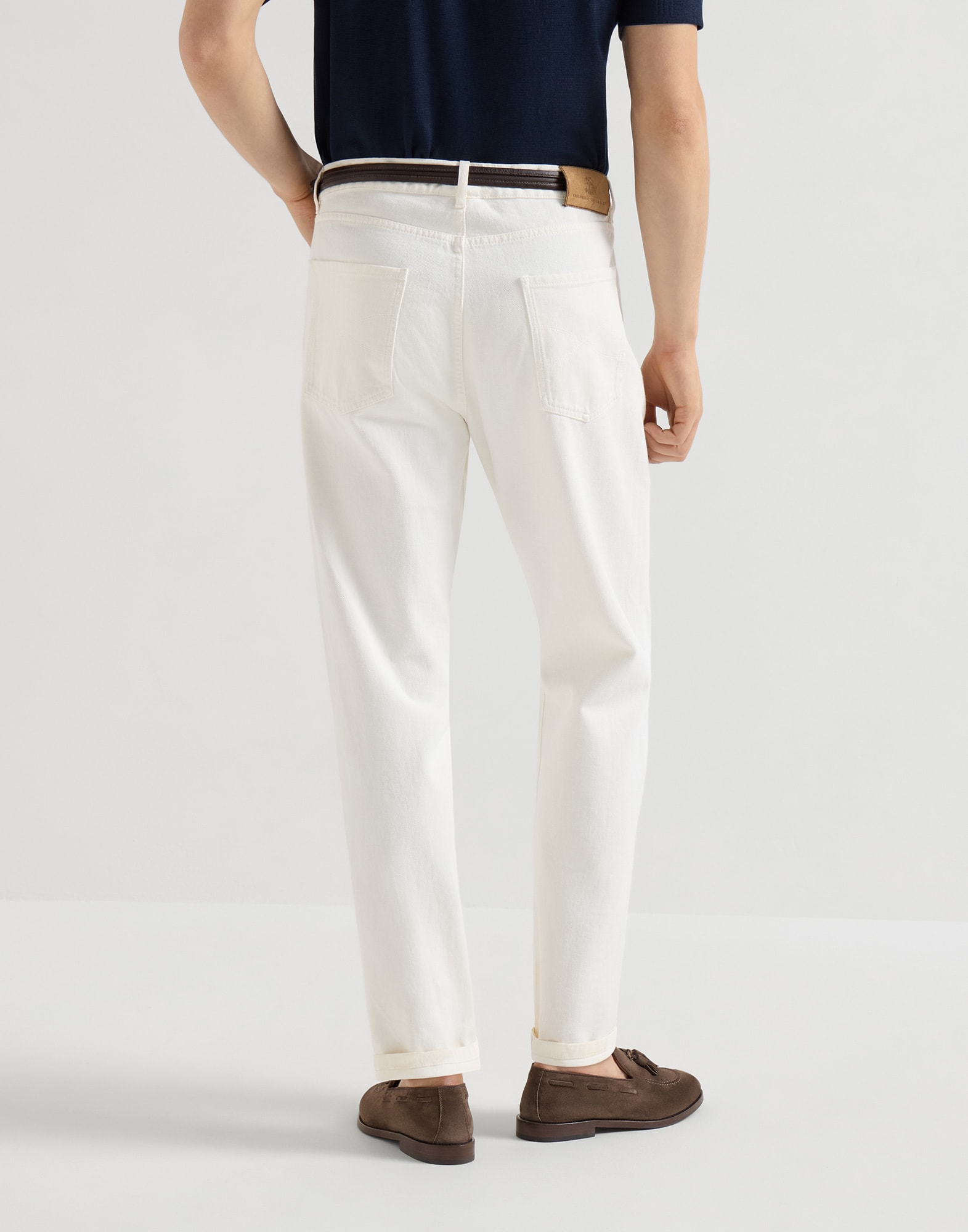 Garment-dyed denim trousers for Man in White | Brunello Cucinelli