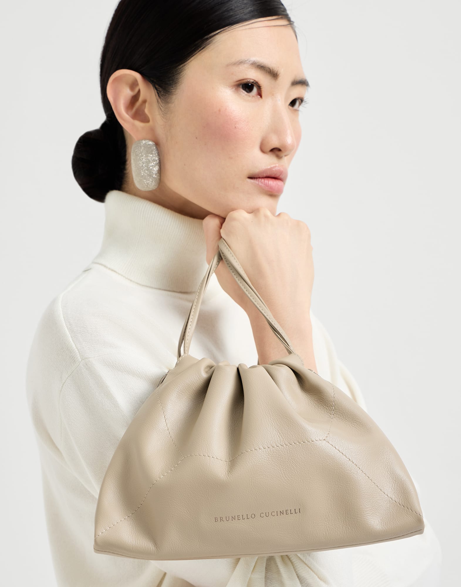 Pouch bag with monili for Woman in Buff | Brunello Cucinelli