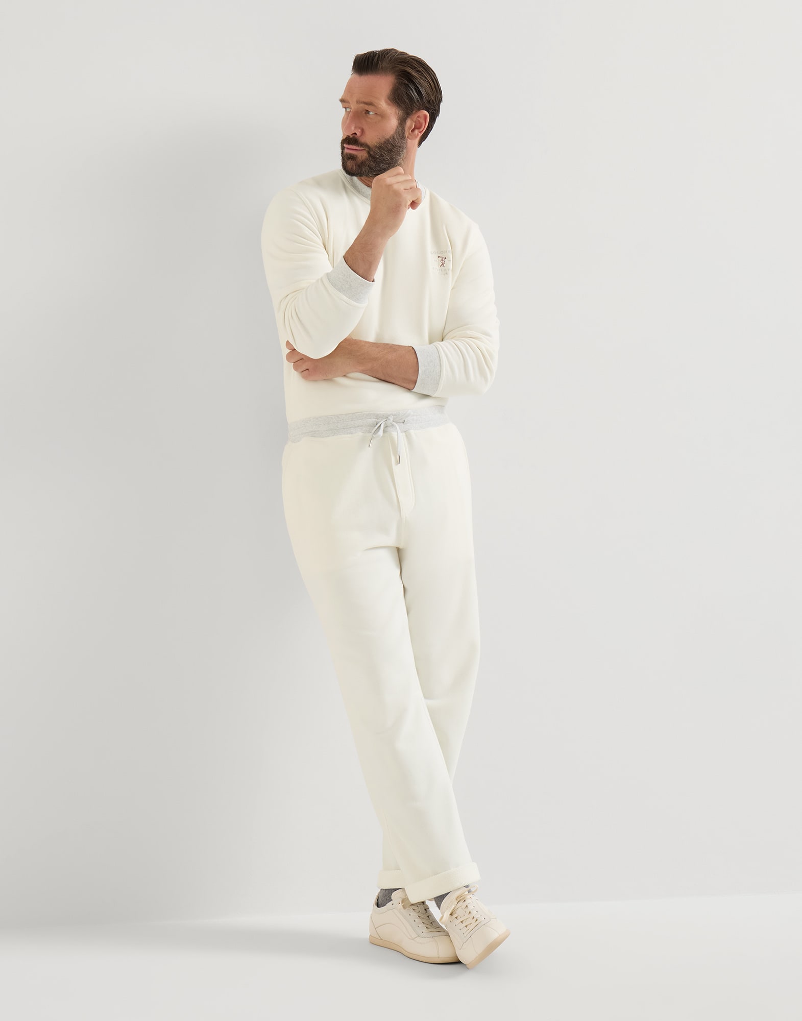 Trousers with embroidery for Man in Off-White | Brunello Cucinelli