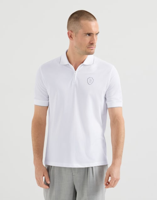 Techno piqué polo shirt with half zip for Man in White | Brunello