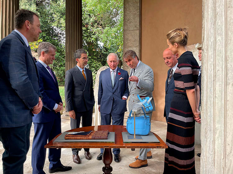 Brunello Cucinelli insieme all'allora Principe Carlo del Galles e Federico Marchetti