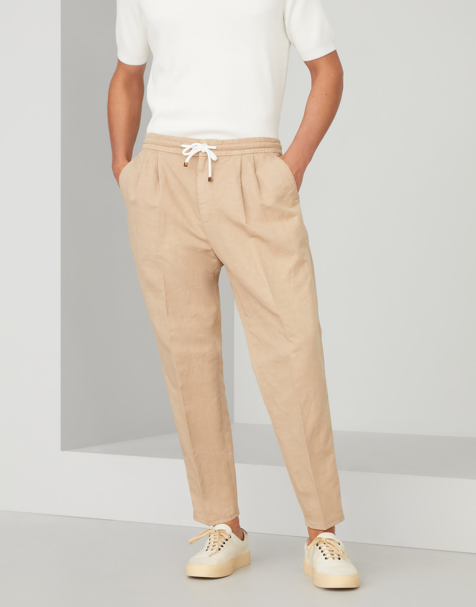 Leisure fit trousers with drawstring Beige Man -
                        Brunello Cucinelli
                    