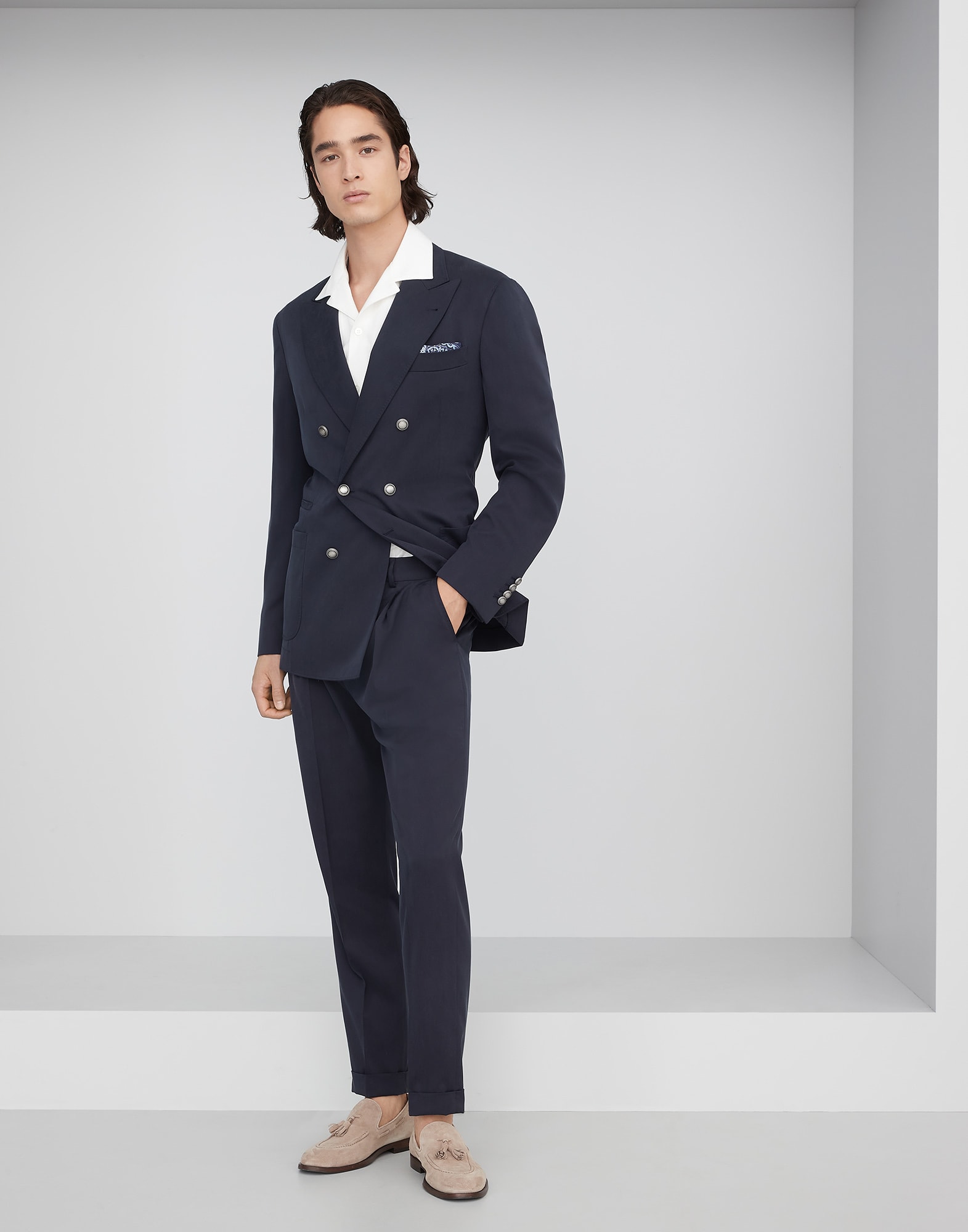 Suit with one-and-a-half-breasted jacket